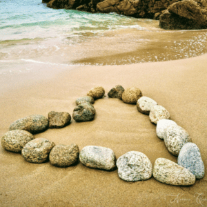 Photographie amours sur plage.